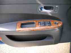2006 Buick LaCrosse CXS, driver's door and controls.